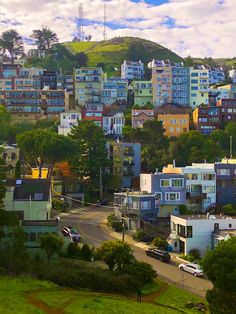 a city with lots of houses on the hillside