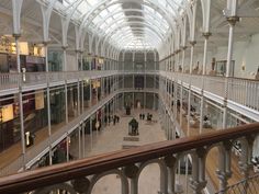 the inside of a large building with lots of windows