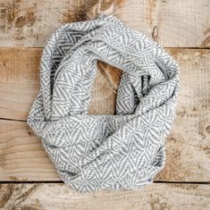 White Infinity Scarf - with light grey details  This very soft knitted infinity scarf is made of a soft wool and orlon blend. Versatile, you can wear it in many ways, it will always keep you warm!  This cozy scarf best feature is its comfortable feel and lightweight finish while being very warm. This beautiful tube scarf as a delicate pattern for a minimalist and modern look. Always in fashion, it goes well with most outfits and is perfect for every season. This product is very versatile, it can be used as a scarf, a pashmina shawl or an hooded circle scarf. The hunt is over, with this fashion scarf you have found the ideal best friend gift ! Unique gift for her of  gift for mom. Our Artisan Scarf Collection is handmade by the talented women of the Otavalo community in Ecuador. We celebrat Neutral Scarf, Knitted Infinity Scarf, Modern Bohemian Home, White Infinity, Goods Design, White Tube, Alpaca Scarf, Tube Scarf, Kids Scarf