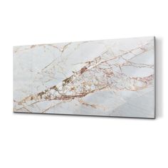 a white marble wall with gold veining