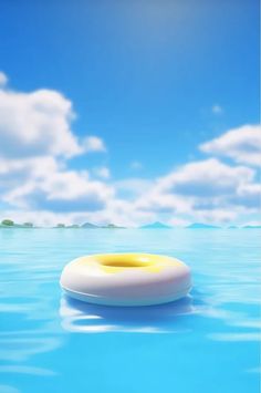 an inflatable float floating on the water under a blue sky with white clouds