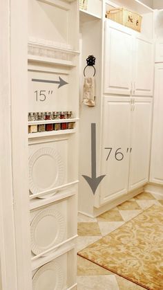 a white closet filled with lots of cabinets and drawers