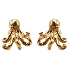 Introducing Rossella Ugolini's enchanting 18K Yellow Gold stud earrings, meticulously handcrafted in Italy. These captivating earrings feature an Octopus shape, making them a delightful choice for Nature and Sea enthusiasts. Crafted with the unique Carved Wax technique, these earrings boast a one-of-a-kind design that is both playful and expressive. Their unisex appeal adds versatility to any wardrobe. Designed for pierced ears, these earrings can also be customized for clip-on wear, with a turn Octopus Head, Yellow Gold Stud Earrings, Gold Stud Earrings, Dynamic Design, Gold Stud, Pierced Ears, Gold Earrings Studs, Gold Studs, Jewelry Earrings Studs