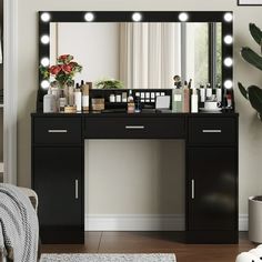 there is a vanity with lights on it and a chair in front of the mirror