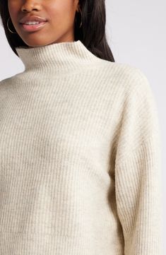 Be ready for chilly forecasts in a supersoft sweater that's topped with a ribbed mock neck and framed by roomy dropped shoulders. Mock neck Long sleeves Dropped shoulders 34% acrylic, 33% polyester, 30% recycled polyester, 3% spandex Machine wash, dry flat Imported Be Ready, Beige Sweater, Mock Neck Sweater, Drop Shoulder, Neck Sweater, Mock Neck, Oatmeal, Top Brands, Nordstrom