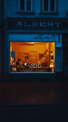 an image of a store front at night