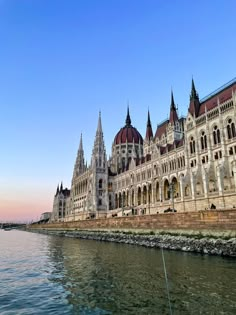 the parliament building is next to the water