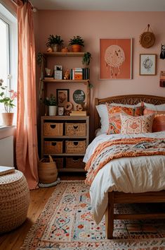 a bedroom with pink walls and orange curtains