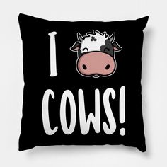 a black and white pillow with the words i cows on it