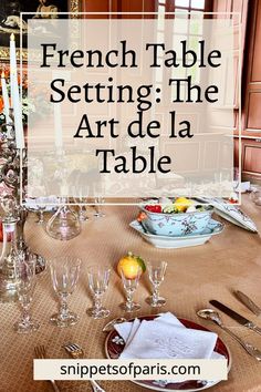 a dining room table set up with place settings