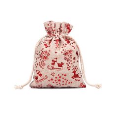 a red and white drawsack bag with reindeers on it, sitting against a white background