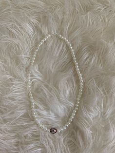 A pearl necklace with glass beads and a charm. 14 inches long My instagram is @Amb3rkennedy ! fairy, crystal, coquette, cottage-core, y2k Alt Jewelry, Coquette Necklace, Necklace Coquette, Rey Aesthetic, Fashion Coquette, Jewelry Casual, Aesthetic Spring, White Crystals, Jewelry Beaded