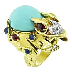 This is a charming 18k yellow gold and platinum frog ring by Hammerman Brothers. The ring is set with cabochon turquoise, sapphires and rubies and round cut diamonds. The sapphires and rubies weigh 1.50ct and 1.25ct respectively. The top of the ring measures 35.5mm by 24mm. The ring is stamped HB PT950 750 HB and weighs 33 grams. The ring is size 6 but it can be resized. Frog Ring, American Diamond Jewellery, American Government, Diamond Cocktail Rings, Platinum Engagement Rings, Sapphire Diamond Ring, American Diamond, Ruby Diamond, Gold Diamond Rings