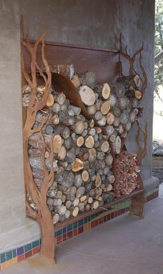 there is a firewood rack with logs on it