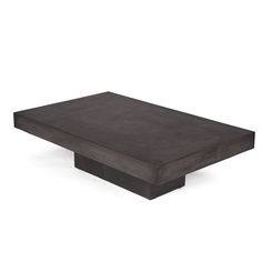 a black square table sitting on top of a white floor