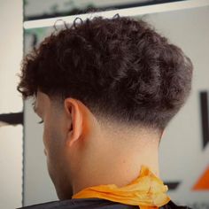 The Textured Fade with French cutting and curls is a contemporary men's hairstyle that combines a skin fade on the sides and back with a curly, textured top. The fade gradually blends into the curls on top, offering a clean yet dynamic look. This hairstyle is perfect for men with natural curls who want a stylish, low-maintenance cut that showcases their hair's natural texture.#TexturedFade#CurlyHair#MensHair#FrenchCutting#ModernHairstyle#MensGrooming#HairTrends2024 Curly Skin Fade, Haircut Skin Fade, Taper Haircut Men, Textured Fade, Fade Curly Hair, Low Fade Curly Hair, Curly Taper Fade, Current Haircuts, Haircuts For Balding Men