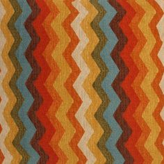 a multicolored rug with wavy lines on it