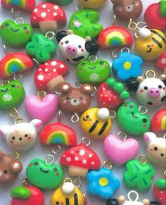 many different colored mushrooms and other items on a white surface with text overlay that reads polymer charms