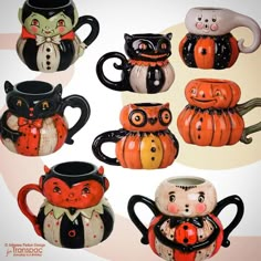 a collection of halloween themed coffee mugs with cats and pumpkins painted on them