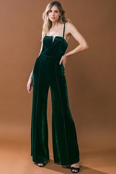 Add some drama to your look with this BLOW A KISS VELVET JUMPSUIT. It features a straight neckline with front V detail, luscious wide-leg design, and a convenient back zipper closure. The velvet fabric offers the wearer a luxurious feel and a sophisticated style. This jumpsuit is an essential for any wardrobe. Details Self: 94% Polyester 6% Spandex Lining: 100% Polyester Size & Fit - Model is 5`8" And Wearing Size Small - Measurements Taken From Size Small - Approx. Length: 58" Upscale Chic Outfit, Velvet Outfits, Velvet Jumpsuits For Women, Red Velvet Jumpsuit Outfit, Velvet Jumpsuit Outfit, Green Velvet Jumpsuit, Green Velvet Bell Bottoms, Velour Jumpsuit, Flying Tomato