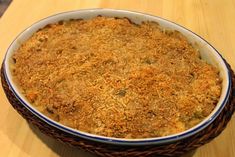 a large casserole dish on a wooden table