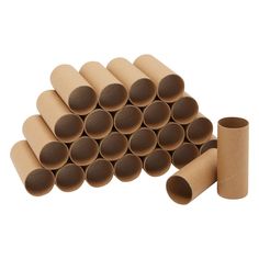 a pile of brown paper tubes sitting on top of each other