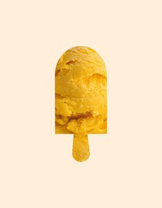 an ice cream cone with yellow icing