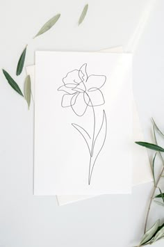 a card with a flower drawn on it