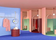 a bathroom with blue, pink and green walls