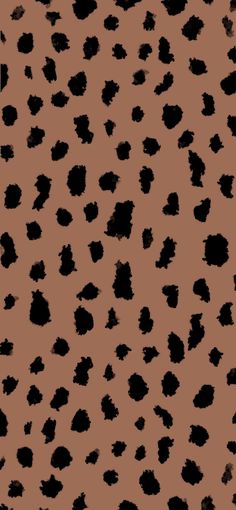 an animal print pattern with black spots on brown and tan background, which is very similar to the leopard's fur