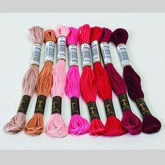 six skeins of different colors of yarn