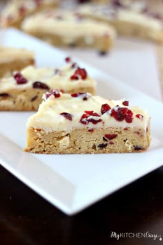 white chocolate and cranberry bars on a plate