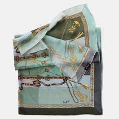 This elegant equestrian design in rich tones of mint, olive, robins egg blue and laurel is made from luxurious, buttery soft silk satin. This piece is a classic addition to any wardrobe, and I love how it adds a polished finishing touch to any look. It’s the perfect way to bring a bit of timeless style and sophistication to your outfits. Details Classic foulard size: Approx. 35" x 35" (90 x 90cm). Once made famous by the likes of Audrey Hepburn, Sophia Loren and Grace Kelly, a foulard will alway Elegant Green Silk Scarf, Green Silk Scarf For Formal Occasions, Formal Green Silk Scarf, Elegant Green Satin Silk Scarf, Italian Silk Scarf, Small Boutique, Hand Roll, Sophia Loren, Rolled Hem