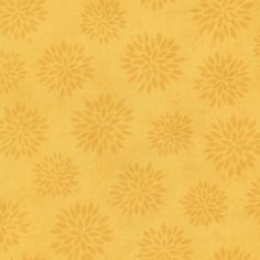 an orange and yellow background with small flowers