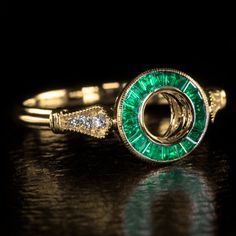 a close up of a ring on a table with a black background in the background