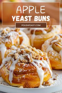 apple yeast buns with icing on a white plate