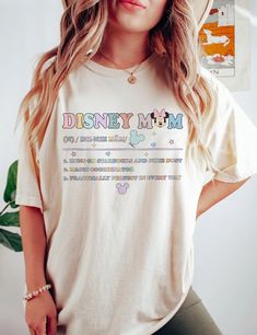 Disney Short Sleeve T-shirt With Letter Print, Disney Short Sleeve Letter Print T-shirt, Graphic Tee With Letter Print For Disney Fan Events, Disney Letter Print Relaxed Fit T-shirt, Disney Multicolor Letter Print T-shirt, Disney-themed Cotton Shirt, Disney Cotton Shirt, Disney Cotton Crew Neck T-shirt, Relaxed Fit Graphic T-shirt For Disney Fan Events