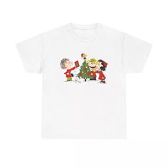 a white t - shirt with an image of two people and a christmas tree on it