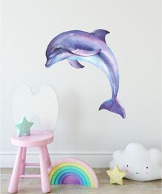 a wall decal with a dolphin jumping out of the water