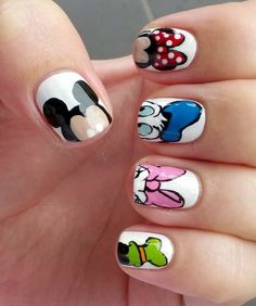 Disney Characters Mickey, Minnie, Donald, Daisy, Goofy… they’re all here. The white backdrop will really make the character art pop! We’re sure you’ll adore this delightful design! Mouse Nail Art, Mickey Mouse Nail Art, Disney Nail Art, Disneyland Nails, Disney Inspired Nails, Disney Nails