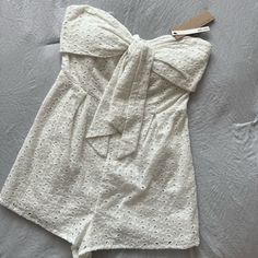 White Romper Versatile And Can Be Used For Multiple Occasions Such As Game Day, Girls Day, Winery, Bride To Be Etc Olive Green Lace Dress, Black Mermaid Gown, Strapless Casual Dress, White Floral Sundress, Mid Thigh Dress, Strapless Evening Gowns, Pink Strapless Dress, Bridesmaid Dresses Strapless, Strapless Bodycon Dress