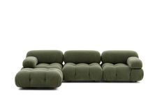 two green couches sitting next to each other on a white surface with no one in it