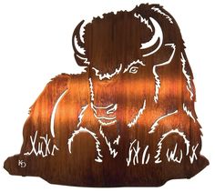 a wooden sign with an image of a bison on it