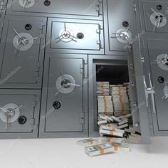 an open vault with stacks of money in front of it and the door opened stock photo