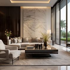 an elegant living room with marble walls and flooring