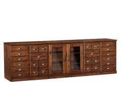 a large wooden cabinet with drawers and glass doors on the bottom shelf, in front of a white background