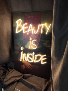 a sign that reads, beauty is inside