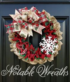 a christmas wreath is hanging on the front door