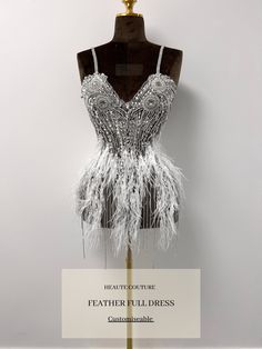 PLEASE WATCH VIDEO Indulge in our Hand Crafted Stretch White Ostrich Feather Haute Couture Luxury Crystal Rhinestone Embellished DRESS, Perfect for any special occasion! This is exactly what you're missing from your special day, have all your guests in dazzled by the beauty of this amazing dress. This stunning dress is complete with rhinestone tassels, for a unique final touch SIMILAR PRODUCTS: VELOUR DRESS: https://www.etsy.com/uk/listing/1248400817/full-dress-silver-rhinestone-applique?ref=lis Rhinestone Feather Dress, 23 Bday, Rhinestone Mini Dress, Dance Style Outfits, Dance Style, Velour Dress, Dress Silver, Full Dress, Rhinestone Appliques