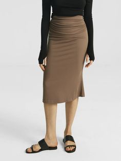 Eco-SkinKiss® Ruched Side Mermaid Midi Skirt – OGLmove Fall Stretch Ruched Skirt, Solid Color Ruched Pencil Skirt, Solid Ruched Pencil Skirt, Solid Color Pencil Skirt With Ruched Detail, Ruched Elastane Pencil Skirt, Casual Stretch Skirt, Casual Stretch Elastane Skirt, Stretch Elastane Skirt For Fall, Fall Stretch Elastane Skirt